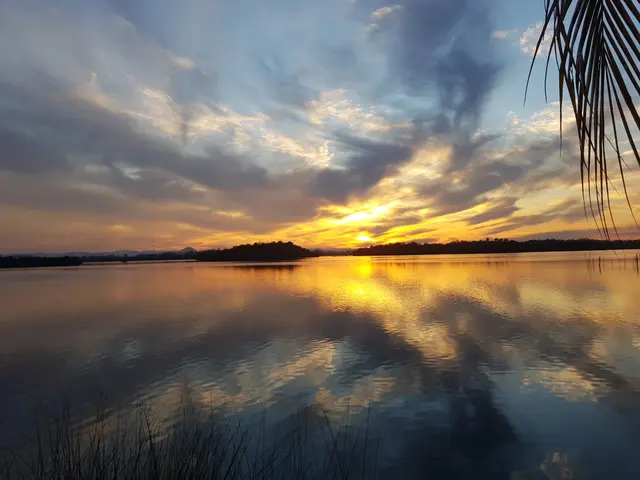 Sunrise over Madu Ganga, photographed in 2019; visible sunrise is not guaranteed.
